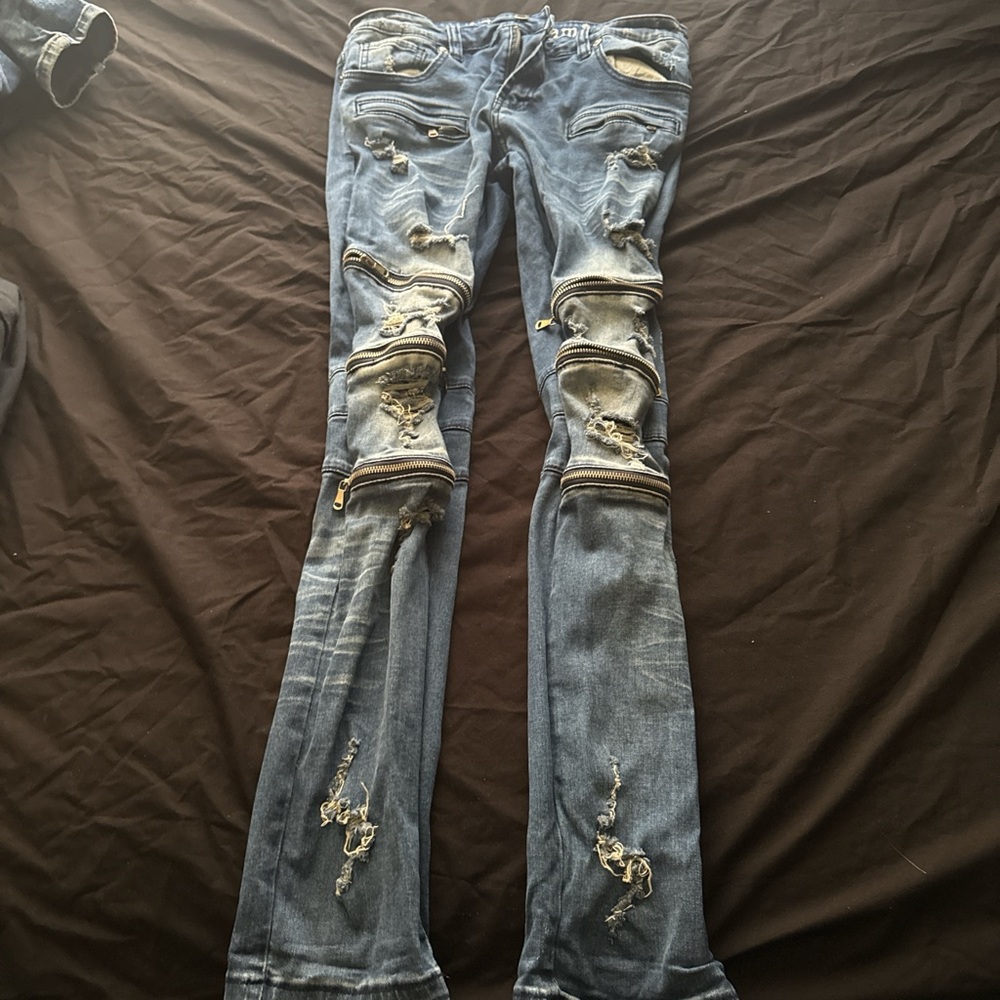Distressed Blue Jeans